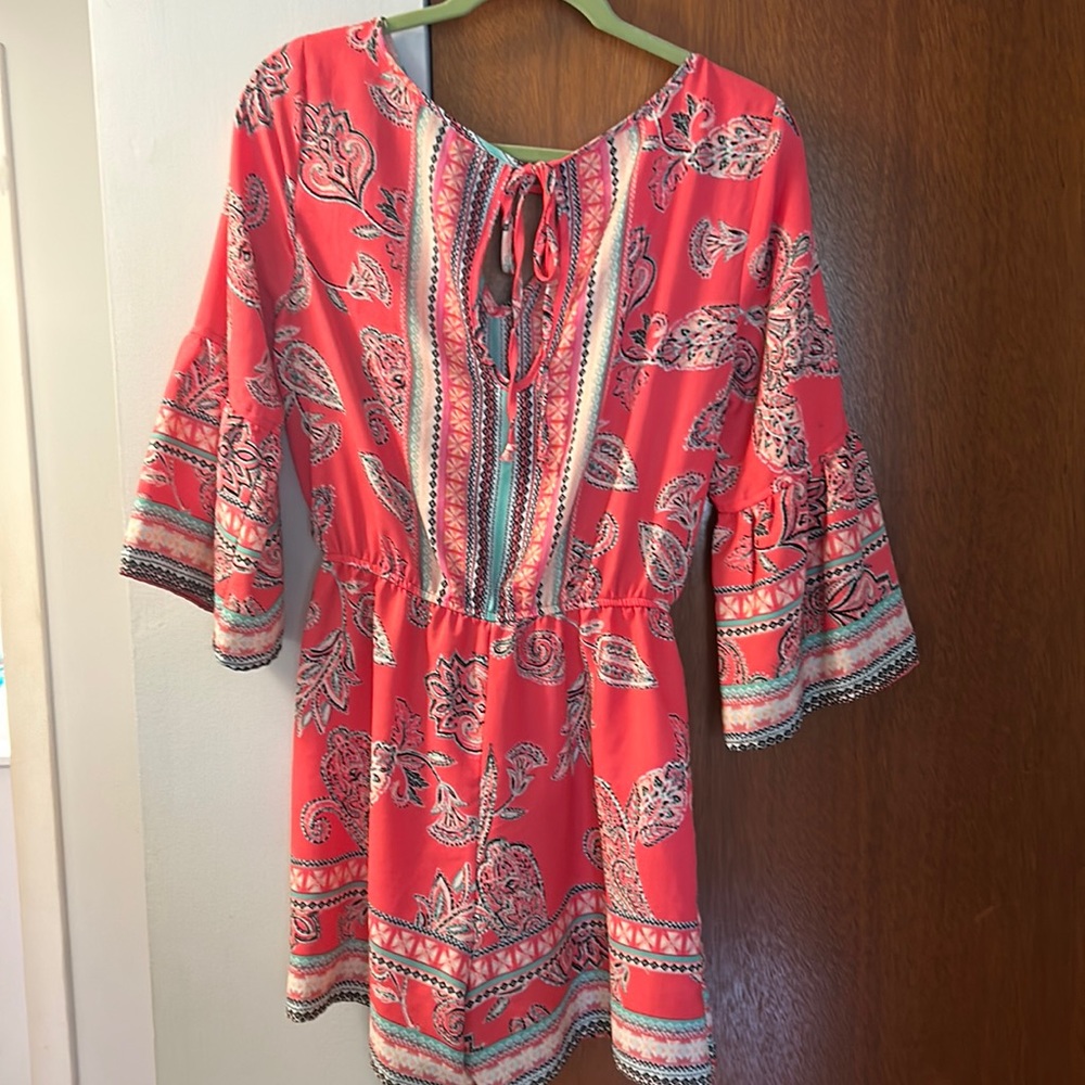Woman’s Romper Coral size Medium